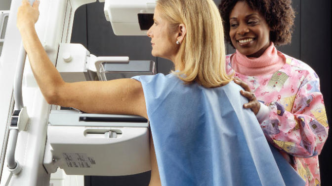 Girls, When you get/got your first mammogram, would you want to wear a gown or would you be comfortable being topless?