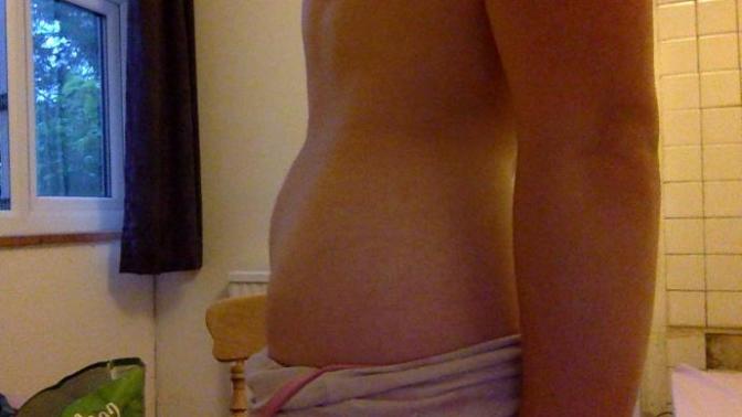Guys, Judging by her stomach and arm in this pictures, does this woman look 'chunky'/chubby etc?