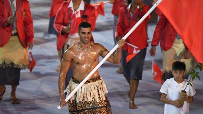 Is the Tonga flag bearer the sexiest man ever?
