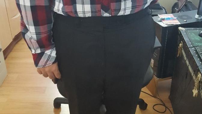 Is it ok to wear a plaid white, black and grey shirt to an interview? If so should it be tucked in?