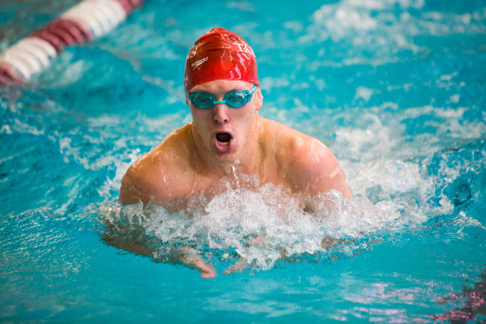 Do you swim with your head above the water or do you stay submerged as long as you can?