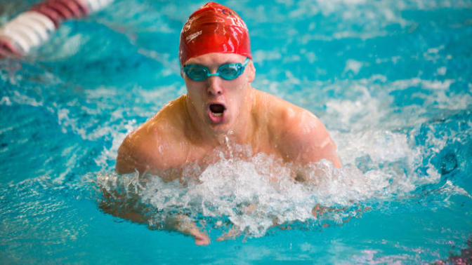Do you swim with your head above the water or do you stay submerged as long as you can?