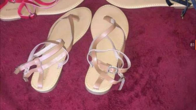 How do the strap on these sandals go?