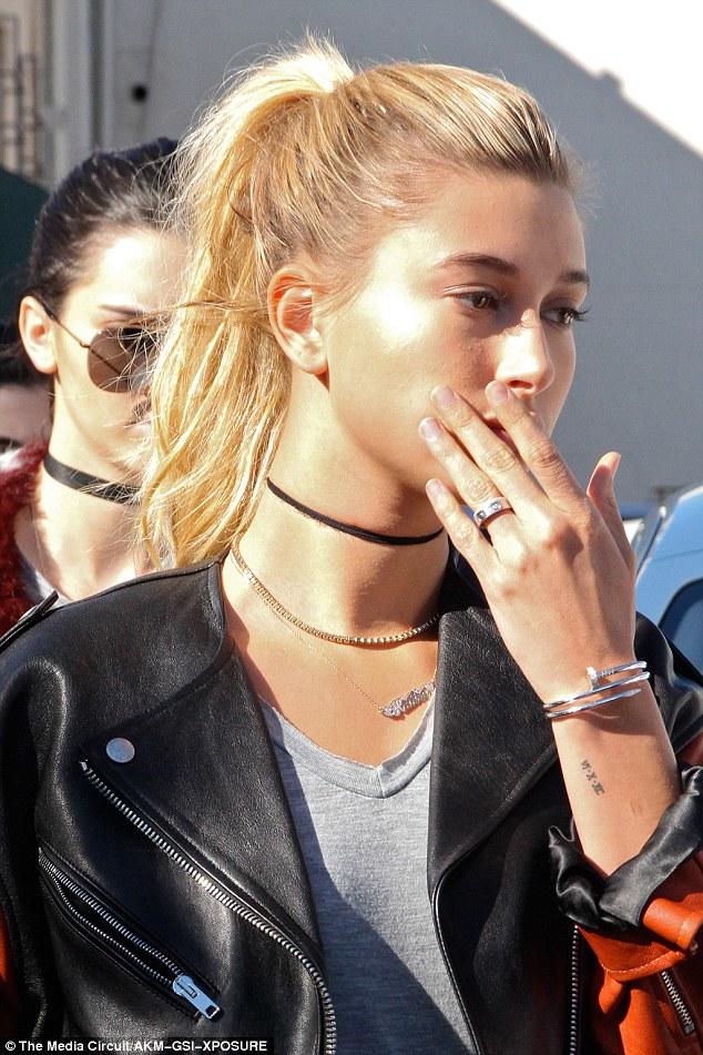 Which of these girls do you think looks the hottest wearing a choker?
