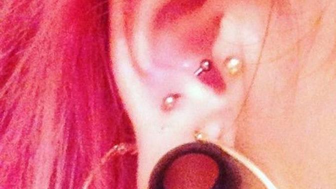 How do I go about my new schools body modification policies?
