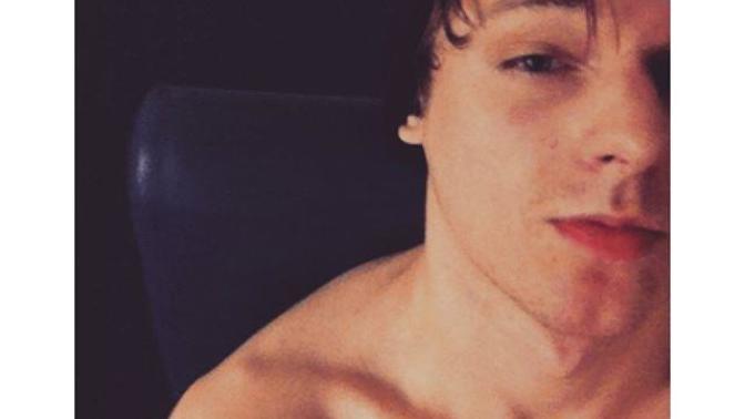 If you take a picture of you topless (male), but you aren't doing it on purpose, is that sexting (pic isn't me) ?