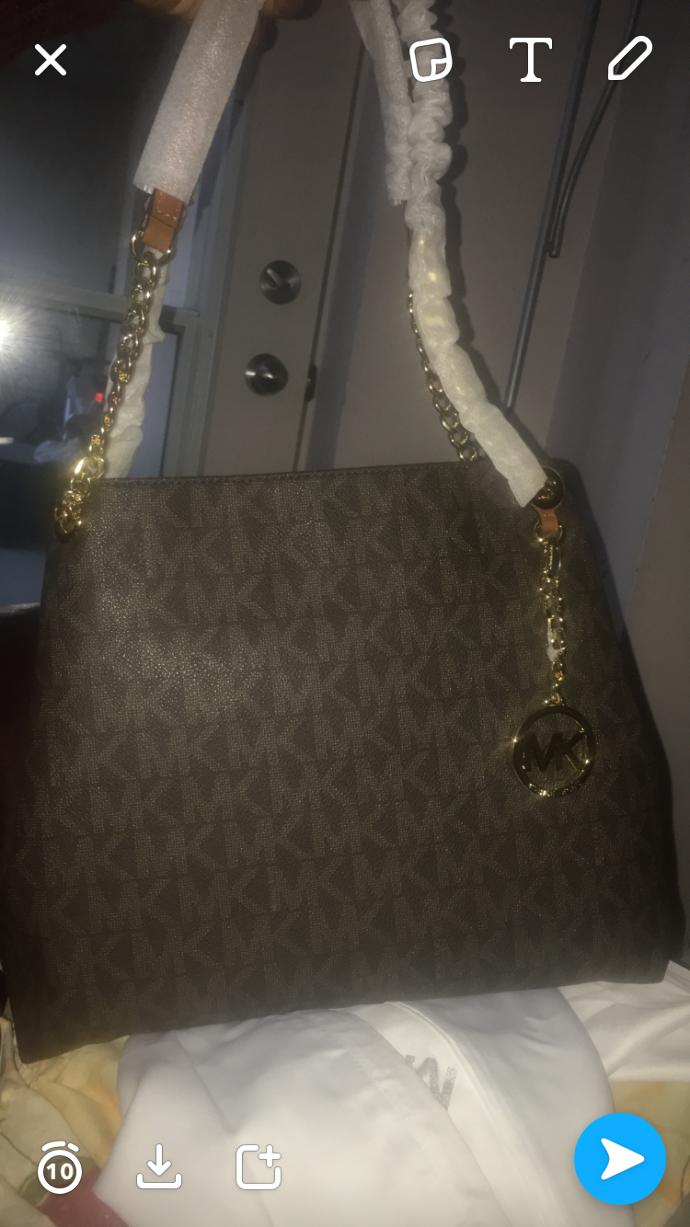 Should I keep this micheal kors bag or return it?