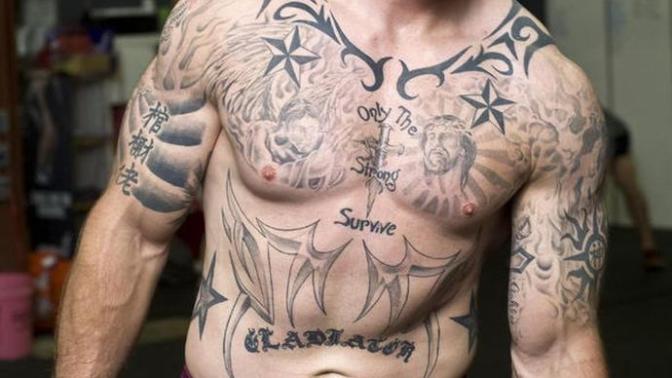 GIRLS, What kind of are more attractive? Muscular Guys or Regular looking guys?
