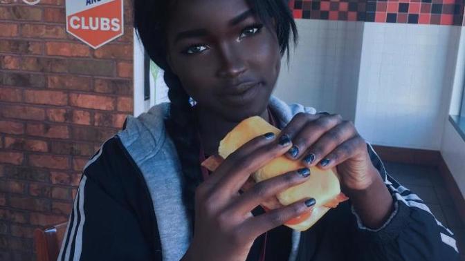 How attractive is the BLACK GIRL and based on her facial features where in Africa do you think she is from?