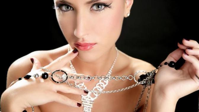 Why do women put makeup, jewellery, and fancy or sexy clothes on?