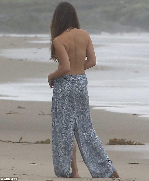 Is it legal or socially acceptable for women to walk around topless in Australia?