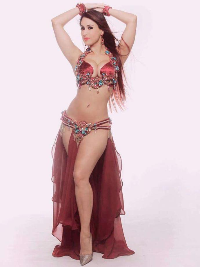 Do think that belly dancing is a seductive dance that objectifies women or an empowering celebration of the female body and all its fertility?