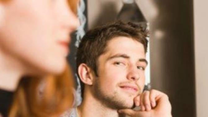 Why would a guy stare and smile at a girl?