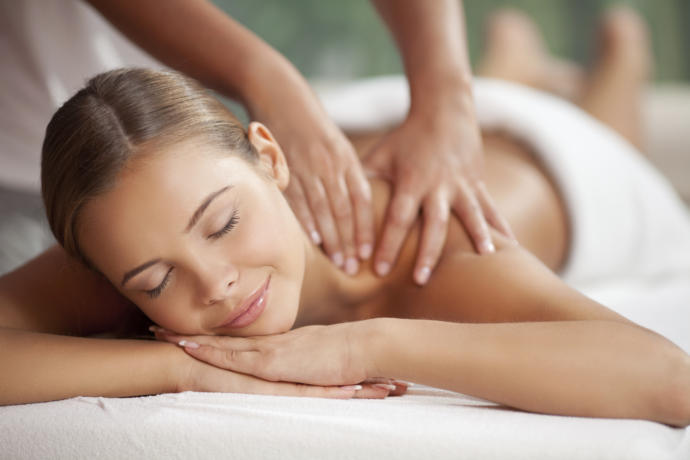 Would it be weird for a someone to give their sister a back rub while she was lying on the bed topless?