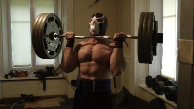 How is the muscular man in the video?