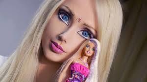 Real- life Ken and Barbie: What's your opinion on plastic surgery obsession?