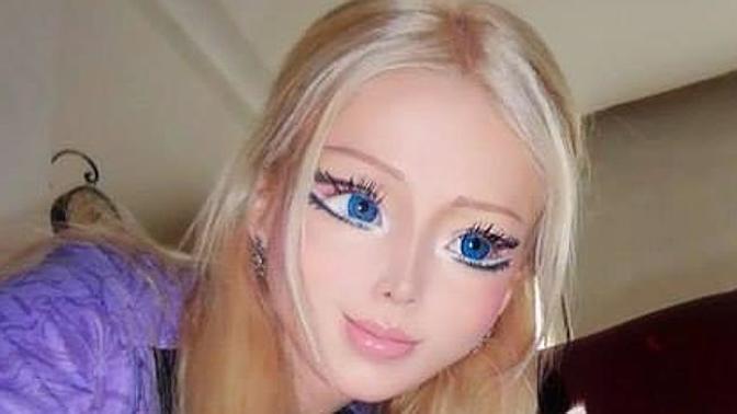 Real- life Ken and Barbie: What's your opinion on plastic surgery obsession?