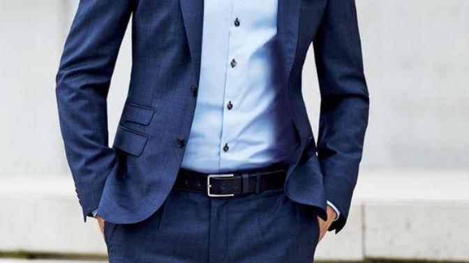 When you see a guy wearing a suit, do you find him more attractive with a tie or without tie?