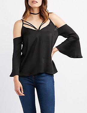 Ladies, What is it about straps on shirts that makes you want to buy it?