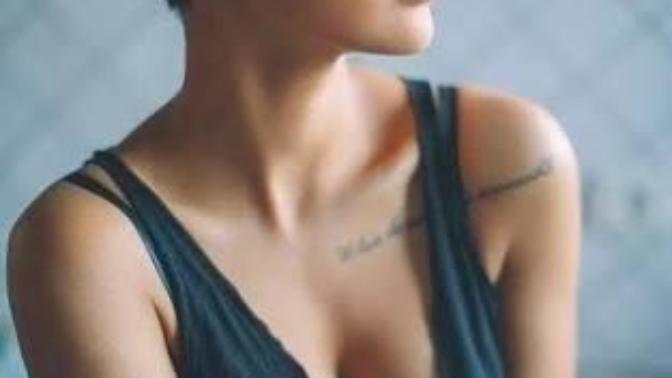Why do I like bold looking girls that prefer sleeveless tops and shorts or jeans only, with short hair ans tattoos all over their body?