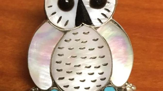 I bought a female co-worker a necklace. Will she think I have romantic feelings for her because of it?