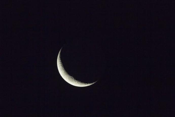 Do you think that the Turkish flag is depicting a crescent moon or a solar eclipse?