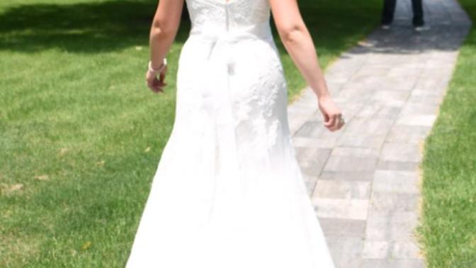 Does the woman in the wedding dress seem heavier than the one in the red?