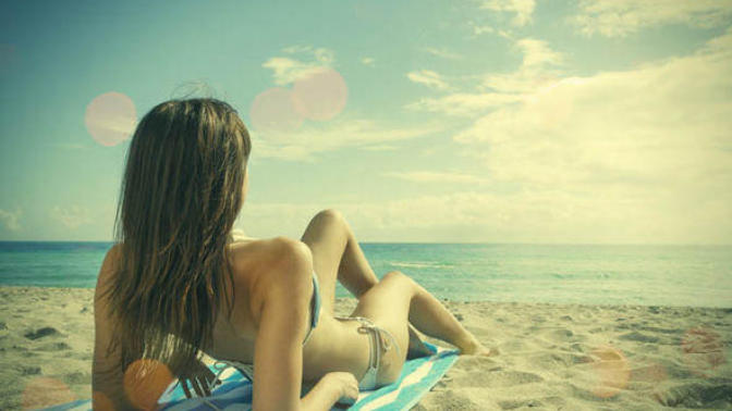 Why are white women obsessed with tanning their skin?
