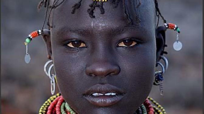Which race has the DARKEST skin color of all other humans?