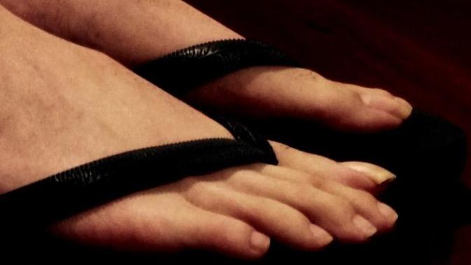 Girls, do you find pretty/feminine feet on a guy attractive? Is it a bad thing for guys to have pretty/feminine feet?