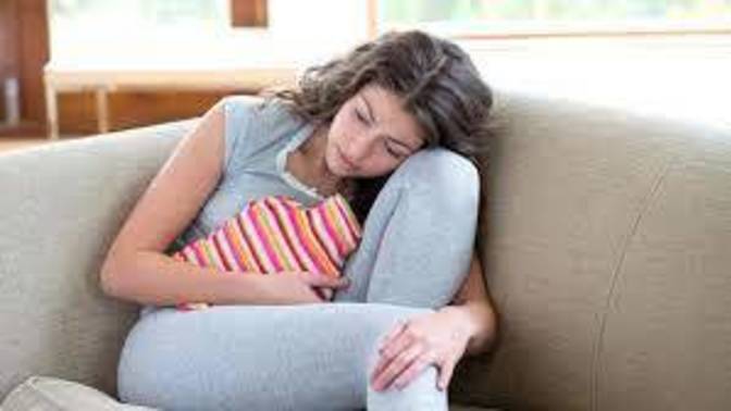 Period cramps or getting kicked in the balls?