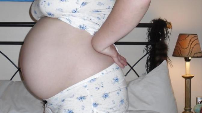 My wife has been for four months pregnant? Why does she have stretch marks and very big belly although it is early?