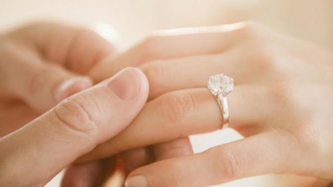 As a woman would it be considered rude to show a boyfriend the kind of engagement ring you want?