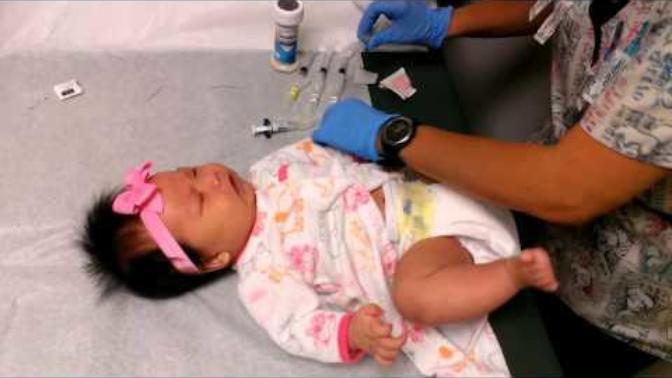 Was the doctor wrong for dragging a baby like this?