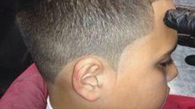 Would you straighten your braracial son's hair (black mixed white) ?