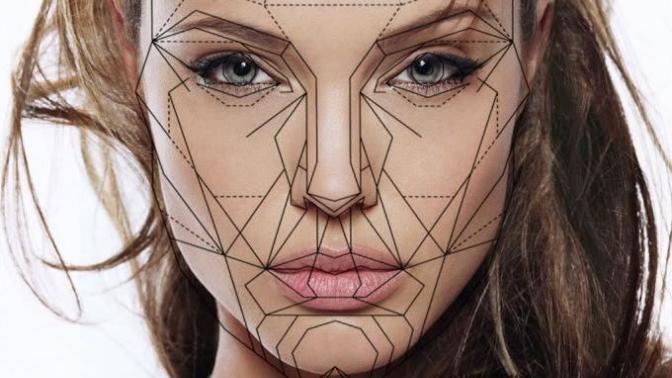What facial traits make a guy think a girl is good looking?