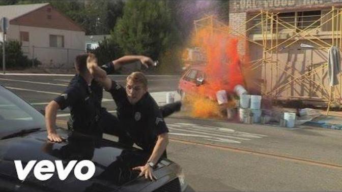 List some songs with crazy/funny/weird music videos or lyrics that you can't help but like?