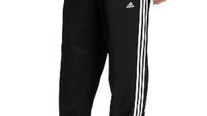 Why do Olympia sports employees wear adidas pants?