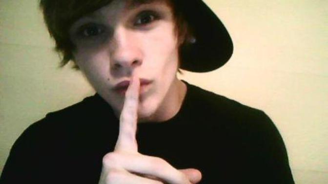 How can a girl tell if a guy is hiding his interest towards her?