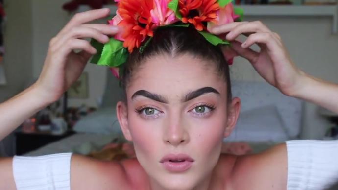 Which makeup look do you like more on a woman for a formal evening occasion (ignore the hair and eyebrows, only look at makeup)?