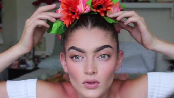 Which makeup look do you like more on a woman for a formal evening occasion (ignore the hair and eyebrows, only look at makeup)?