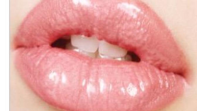 Why are guys attracted to girls with plump lips?