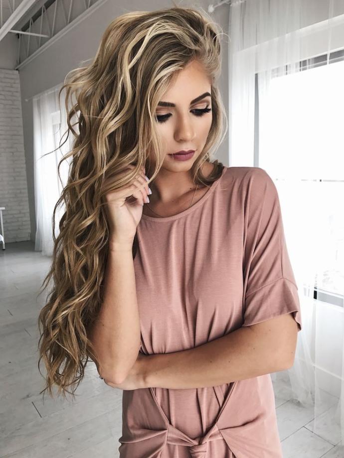 Which hair style is more attractive for long blonde hair?