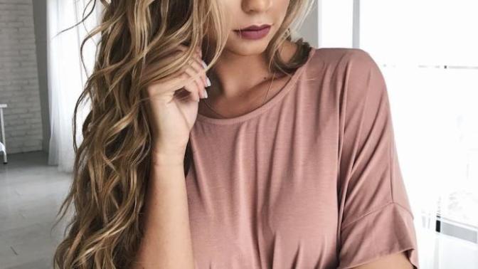Which hair style is more attractive for long blonde hair?