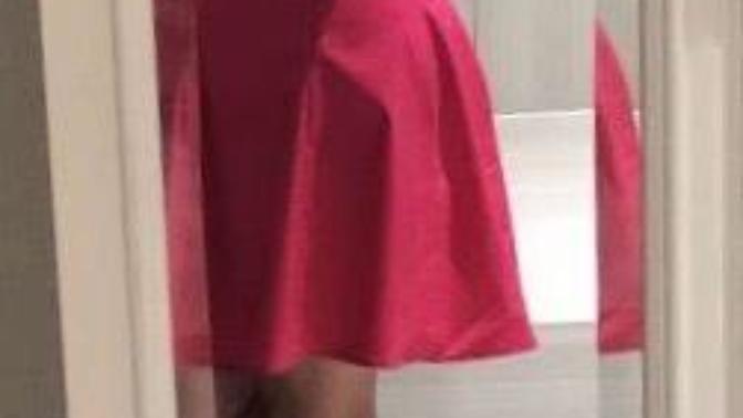Pink dress. White stilettos. I think she looks super cute. Do you agree?