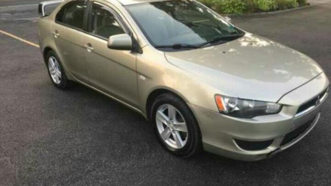 Which car should I buy photo below 2008 mitsubishi lancer or 2007 mazda r8?