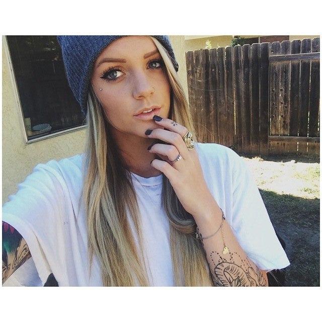 Let's play guess if she's a tomboy or a girly girl. Do you think this girl is a tomboy or a girly girl?