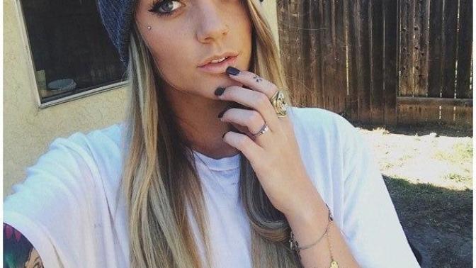 Let's play guess if she's a tomboy or a girly girl. Do you think this girl is a tomboy or a girly girl?
