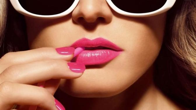 Any idea why a shy girl flirts with me more when she's wearing lipstick?