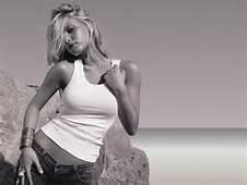 Why do some women put their hands on their thighs or their fingers in their pants or things like that when they pose?